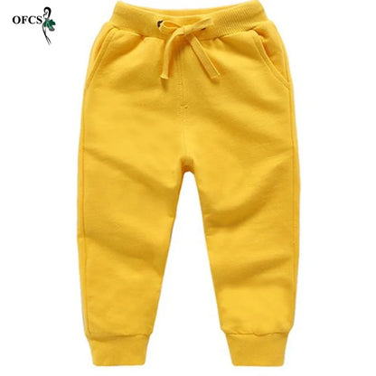 Pantalones Algodón Niños 2-10 Años - Deportivos Casuales Unisex Jogging Cómodos Amarillo - Huellitas de Vida